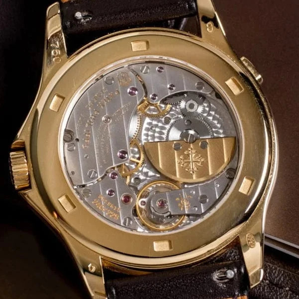 Patek Philippe World Time 18K